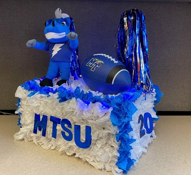 A stuffed animal version of Lightning, MTSU's mascot,  stands on a scaled-down version of a homecoming parade float, one of more than 40 entries submitted for Monday's virtual event broadcast.