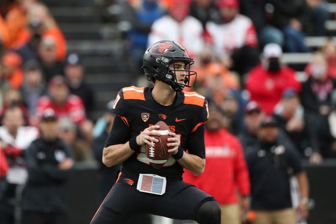 Oregon State quarterback Chance Nolan looks for a receiver during the first half of the team's NCAA college football game against Utah on Saturday, Oct. 23, 2021, in Corvallis, Ore.