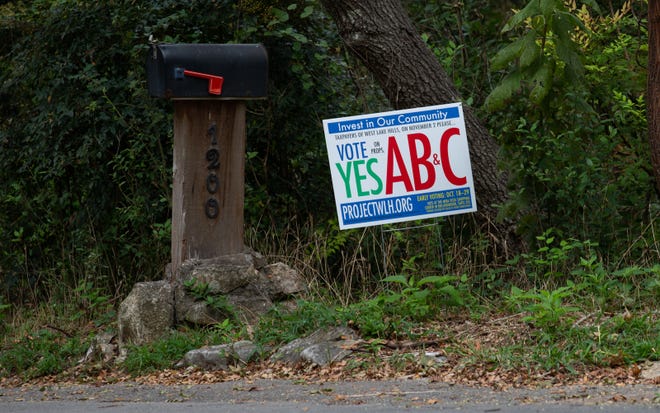 A sign expressing support of Propositions A, B and C is posted next to mail box in West Lake Hills on Oct. 25. All three propositions passed, allowing the city to repair and improve infrastructure, including municipal offices and roads.