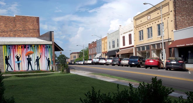 A mural painted by local artist Bedford Smith is visible as visitors enter North Main Street in downtown Mt. Pleasant in Maury County, Tenn.