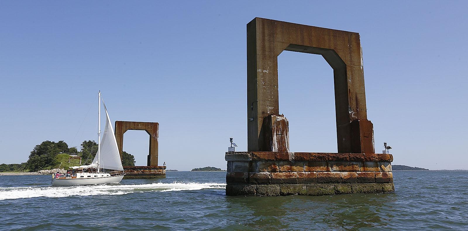 Patriot Ledger file photo of the pilings that once held up Long Island bridge.