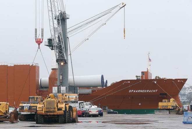 The Dutch cargo ship Spaarnegracht delivers parts of three 1.5-megawatt Vensys turbines to the Port of Providence on Monday.