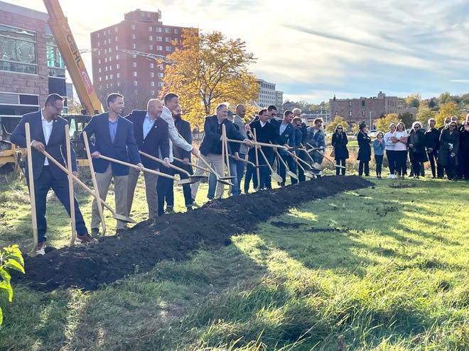 City and business leaders hold shovels as Cherapa Place II breaks ground in downtown Sioux Falls near the Big Sioux River, between East 8th Street 6th Street, next to Cherapa’s original building. October 25, 2021.