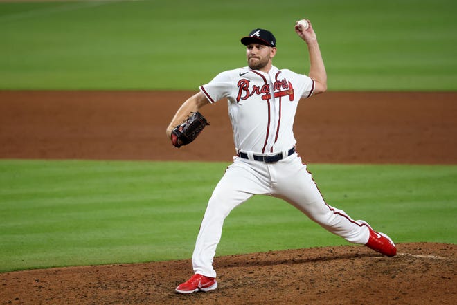 Oct 2, 2021; Atlanta, Georgia, USA; Atlanta Braves relief pitcher Dylan Lee (74) delivers against the New York Mets during the eighth inning at Truist Park. Mandatory Credit: Jason Getz-USA TODAY Sports