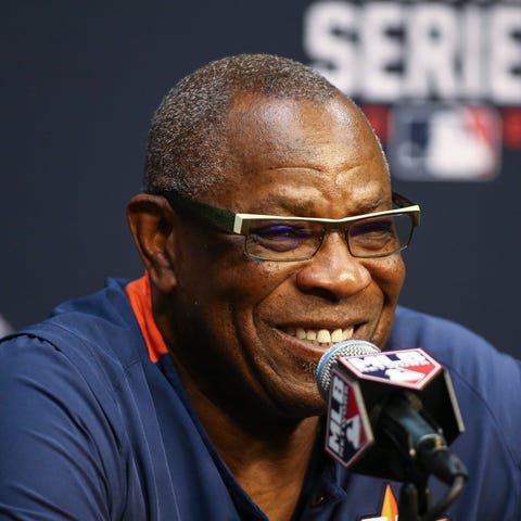 Houston Astros manager Dusty Baker talks with medi