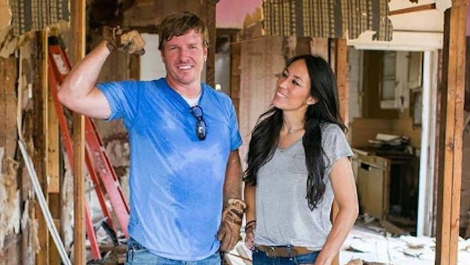 Chip and Joanna Gaines on the set of their home renovation series, "Fixer Upper."