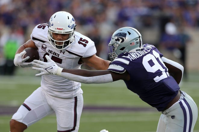 Kansas State defensive end Felix Anudike-Uzomah (91) tracks down Southern Illinois Salukis running back Javon Williams Jr. (15) during their Sept. 11 game at Bill Snyder Family Stadium.