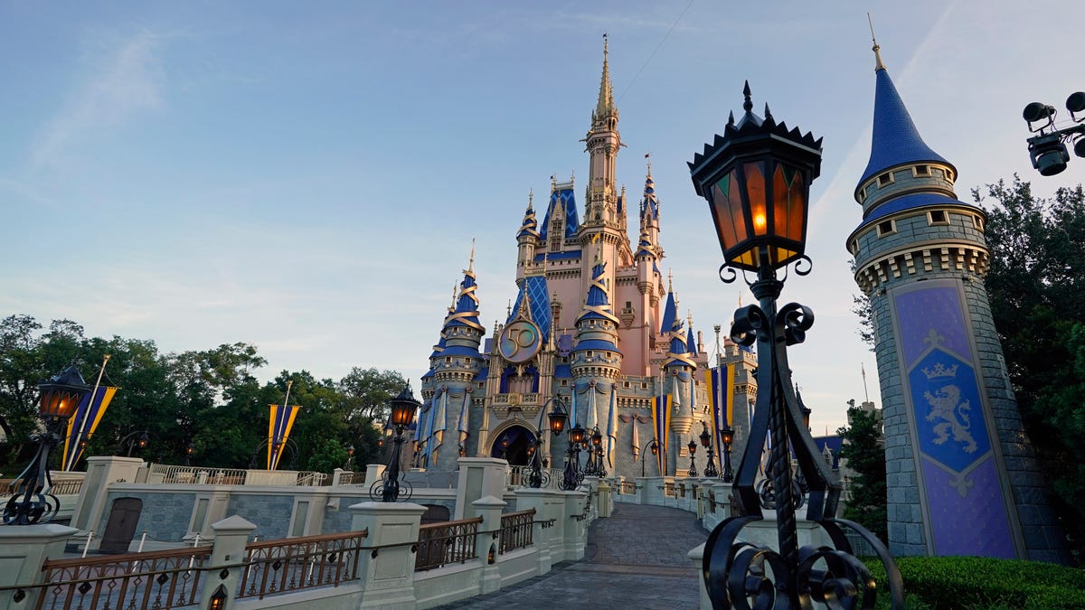 Cinderella Castle got a pink makeover for Walt Disney Word's 50th anniversary celebrations.