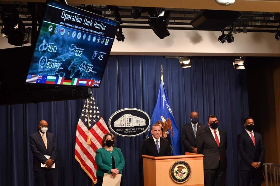 FBI Deputy Director Paul Abbate speaks about Operation Dark HunTor, a joint criminal opioid and darknet enforcement operation, during a press conference at the US Department of Justice in Washington, DC, on October 26, 2021. - Police around the world arrested 150 suspects, including several high-profile targets, involved in buying or selling illegal goods online in one of the largest-ever stings targeting the dark web, Europol said. HunTOR also recovered millions of euros in cash and bitcoin, as well as drugs   and guns.