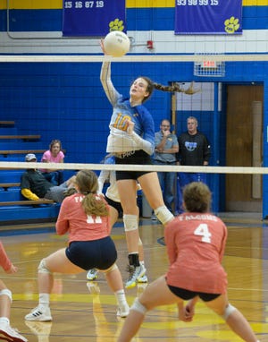 Southwestern Randolph's Riley Key makes a hit at the net against Forbush. The Cougars have reached the third round of the 2-A state playoffs. [Mike Duprez/Courier-Tribune]