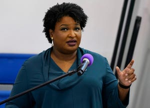 Stacey Abrams speaks during a church service in Norfolk, Va., Sunday, Oct. 17, 2021.
