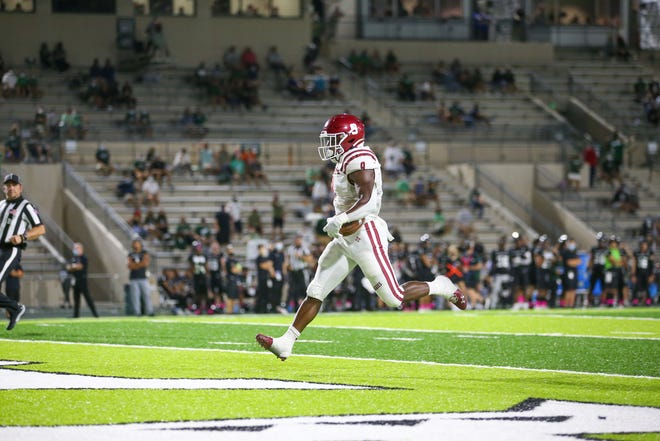 New Mexico State running back Juwaun Price scored two touchdowns against Hawaii on Saturday.