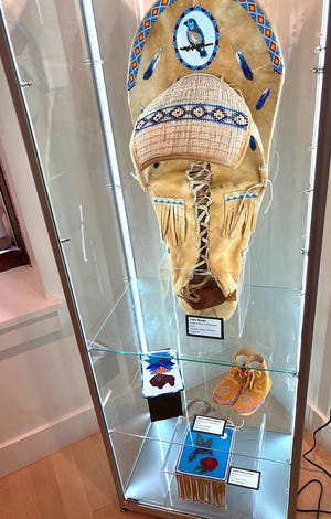A cradleboard is seen on display at the Stewart Indian School Cultural Center & Museum.