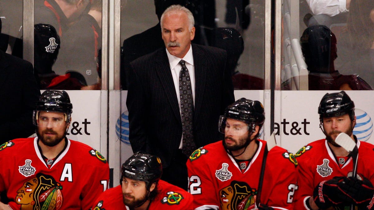 Former Chicago Blackhawks coach Joel Quenneville on the bench during Game 2 of the 2010 Stanley Cup Final.