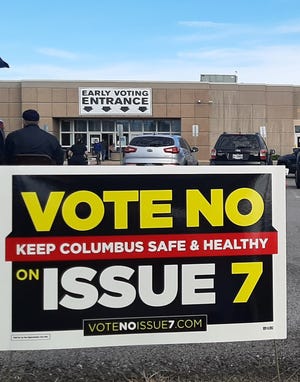 A "Vote No on Issue 7" sign outside the Early Voting center in Columbus