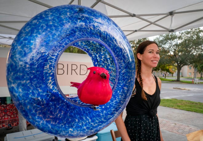 Katie Wacha selling her signature bird feed at The Native Bird tent at the Abacoa Green Market on October 27, 2021 in Jupiter, Florida. The market is open every Wednesday from 5pm-8pm.