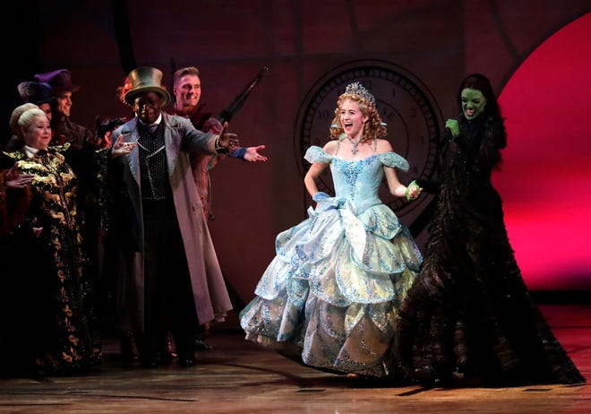 Cast members react to a standing ovation following a performance of "Wicked" on Wednesday night at the Fox Cities Performing Arts Center in Appleton. "Wicked" marks the first time a Broadway show has taken the PAC stage in more than 612 days.