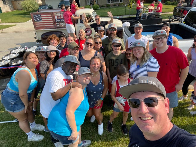 The 11|28 Community, led by Mike Francisco (bottom right) met for the first time in public at the Oak Creek Fourth of July parade in 2021. This church hopes to promote members and "do life different."
