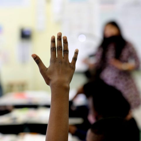 A fourth-grade student in Brooklyn, N.Y., raises h