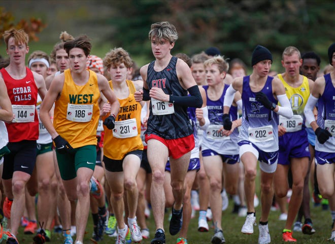 Runners make their way around the course during the Class 4A Iowa high school boys state cross country meet on Friday, Oct. 29, 2021, in Fort Dodge.