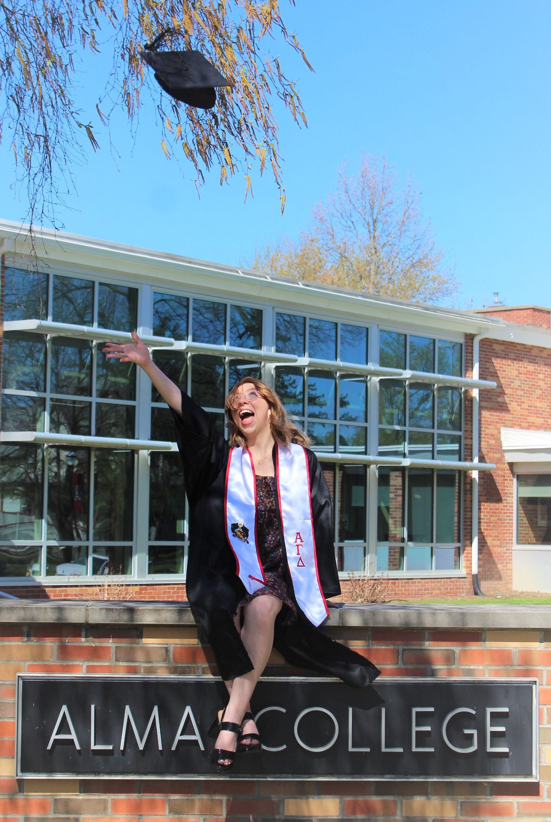 Jordyn Bradley celebrates her graduation from Alma College in May 2021