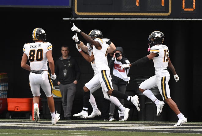 Oct 30, 2021; Nashville, Tennessee, USA; Missouri Tigers wide receiver Keke Chism (6) celebrates after catching a touchdown pass to end the first half against the Vanderbilt Commodores at Vanderbilt Stadium. Mandatory Credit: Christopher Hanewinckel-USA TODAY Sports