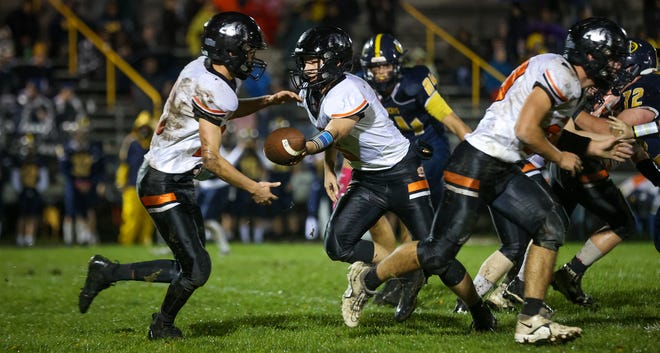 Summerfield quarterback Bryce Kalb hands off to Brandon Thompson in a game last season. Kalb threw for 154 yards and a touchdown, ran for a touchdown, made 9 tackles and recovered a fumble in a 34-0 win over St. Charles Saturday.