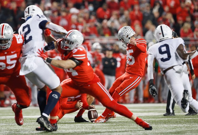 Ohio State Buckeyes place kicker Noah Ruggles (95) kicks a field goal during the fourth quarter of the NCAA football game against the Penn State Nittany Lions at Ohio Stadium in Columbus on Sunday, Oct. 31, 2021. 
