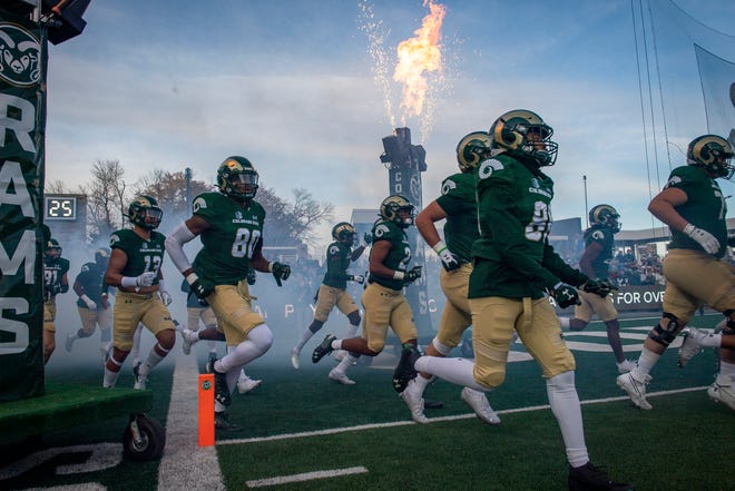 The CSU football team takes the field before playing Boise State at Canvas Stadium on Saturday, Oct. 30, 2021.