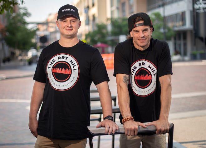 David Payne of Canal Winchester, left, and Colin Thomas of Delaware, friends since their middle school days in Worthington, hope to open The Dry Mill, a sober bar, near Downtown Columbus before the end of the year.