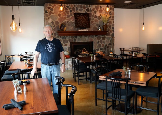 Dick Johnson, owner of The Station in Tecumseh, is pictured in the restaurant's dining room. The Station offers a more casual dining experience than the white tablecloth, fine dining atmosphere of its predecessor, Evans Street Station.