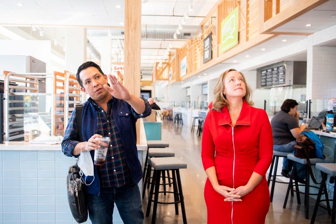 Hospitality HQ co-founder Michael Wetherbee, left, gives a tour of Marble City Market to Knox News with Regas Property partner Stefanie Hess on Nov. 1, 2021. This photo was taken shortly before the opening of the food hall, which has since lost five original vendors, though Wetherbee told Knox News this is no cause for concern.