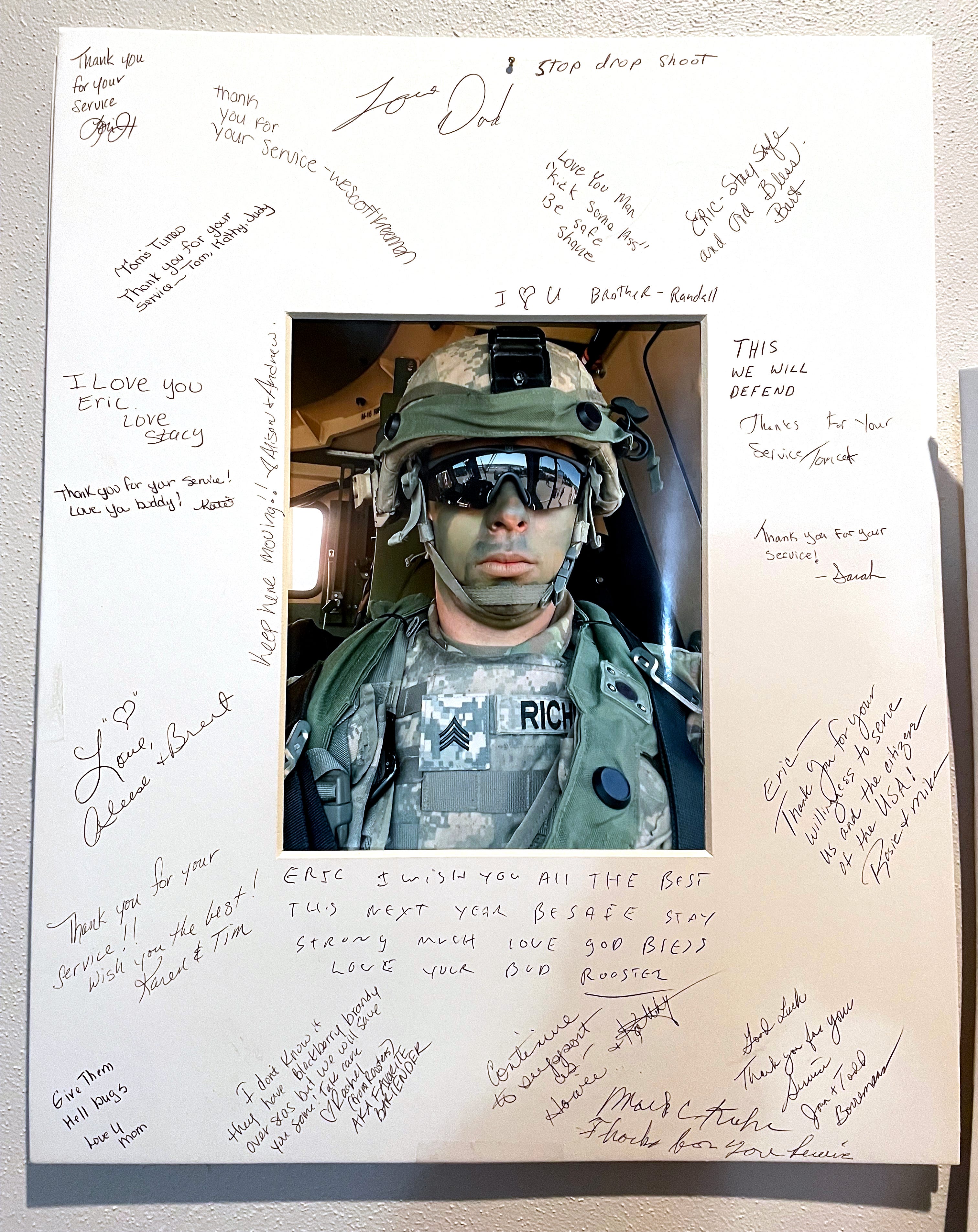 A photo of Eric Richley signed by well-wishers and given to him before he left for Afghanistan.