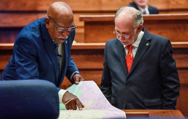 Sen. Rodger Smitherman and Sen. Jim McClendon look over maps during the special session on redistricting at the Alabama Statehouse in Montgomery, Ala., on Monday November 1, 2021. 