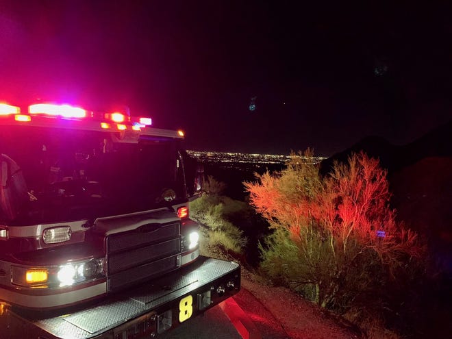 Phoenix firefighters helped a woman off Piestewa Peak after she lost her way in the dark on Sunday, Oct. 31, 2021.
