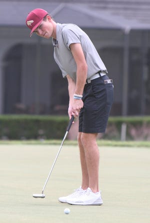 North Marion senior Ryan Letterly watches this birdie putt on the ninth green during Monday's Region 1-Class 2A golf tournament at Golden Ocala Golf Club.