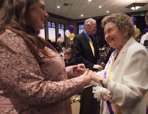 Beverly Fitch McCarthy, right, greets friend Kimberley Yanez during a celebration on Feb. 12, 2020, for McCarthy, the 2019 Stocktonian of the Year.