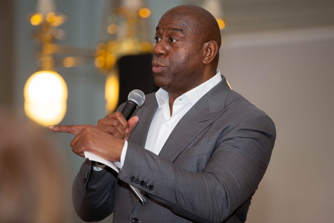 Earvin "Magic" Johnson speaks to students from John Paul II Catholic High School during a roundtable discussion about student athletes' mental health at the Historic Capitol Tuesday, Nov. 2, 2021.