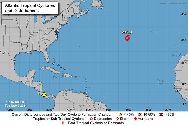 Tropical Storm Wanda is located far out in the Atlantic Ocean and poses no threat to land, forecasters said. Another disturbance (the yellow x) is located near Central America, but isn't expected to develop into a named system.