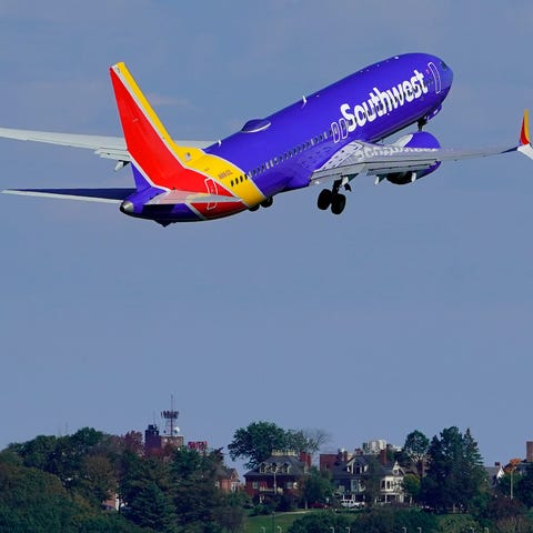 A Southwest Airlines flight takes off from the Por