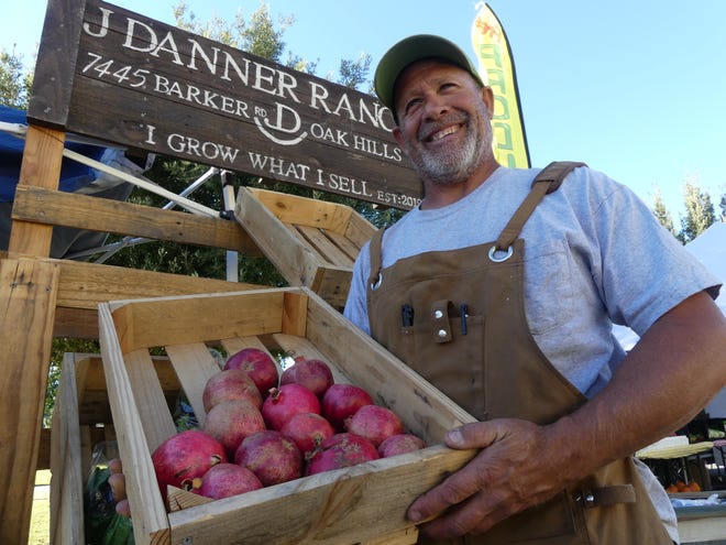 Jimmy Danner, owner of J. Danner Ranch in Oak Hills, showcases his produce at the kickoff of the Hesperia Farmers Market at Civic Plaza Park on Tuesday, Nov. 2, 2021.