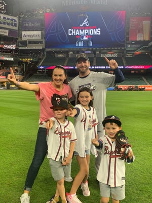 Visalia native Stephen Vogt and his family pose for a photo after the Atlanta Braves won the World Series on Tuesday at Truist Park. Vogt is a former Central Valley Christian standout.