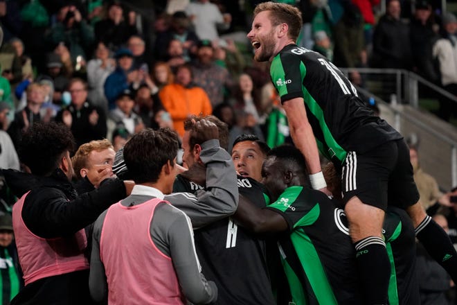 Austin FC's Jon Gallagher, right, and teammates celebrate Jared Stroud's goal against Sporting Kansas City in November at Q2 Stadium. Gallagher signed a four-year deal with El Tree as soon as the season ended.