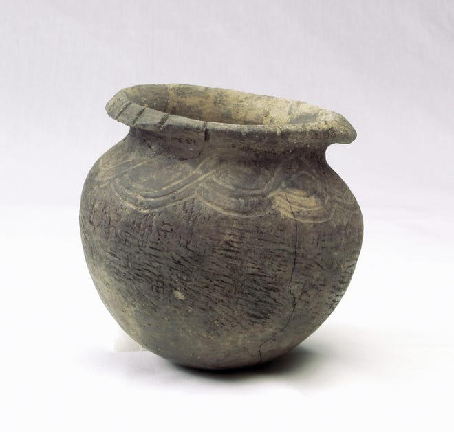 This unglazed, pit-fired clay vessel in the collection of the Ohio History Connection was created by the Fort Ancient culture, which lived in Ohio from roughly 1000 AD to 1650 AD.
