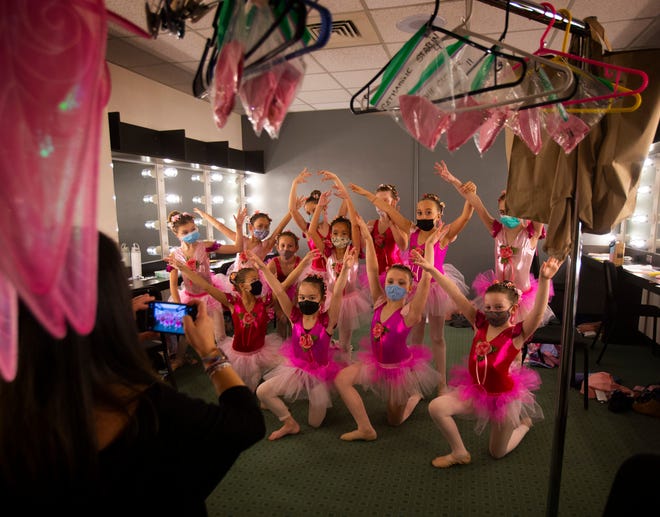 Dressed as pixies for their parts in "Cinderella," young dancers with the Eugene Ballet pose for a photo backstage in the Hult Center before rehearsal.