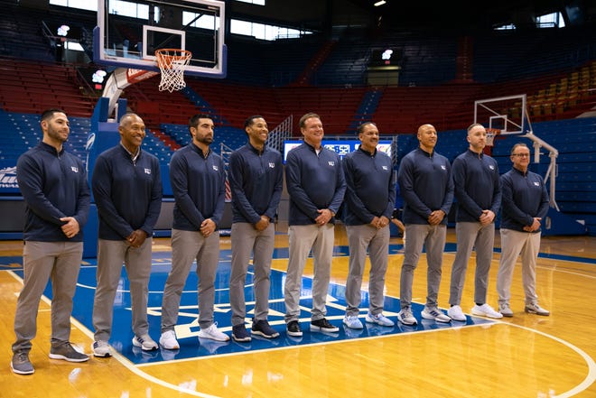 Kansas men's basketball's coaching staff poses for a photo at Allen Fieldhouse on Nov. 2, 2021.
