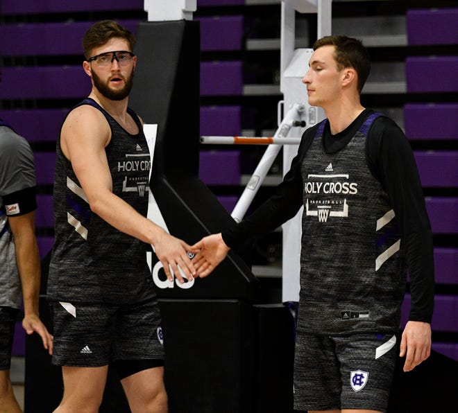 Longtime teammates Mike Rabinovich, left, and Judson Martindale at a Holy Cross men's basketball practice last week.