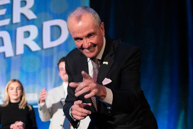 New Jersey Governor Phil Murphy gives a victory speech to supporters at the Grand Arcade at the Pavilion in Asbury Park, New Jersey, November 3, 2021. Murphy won re-election as the first Democratic governor of New Jersey in over 40 years, after narrowly defeating Republican gubernatorial nominee Jack Theaterelli.