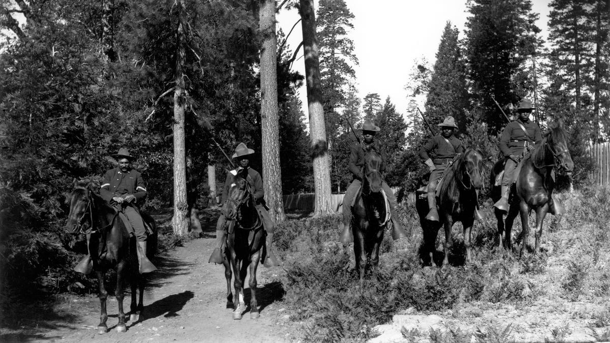 Members of the 24th Infantry are seen at Yosemite National Park in 1899.