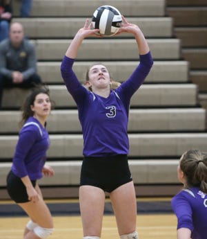 Jackson's Sydney Wake sets the ball during last year's Division I regional semifinal match against Chardon.